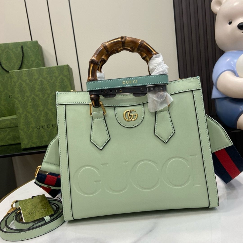G*u*i top handle bags